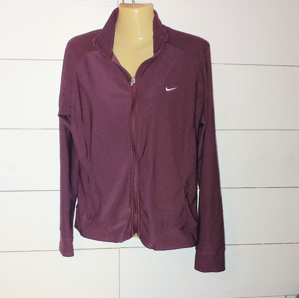 Nike Women's dry fit Large plum colored